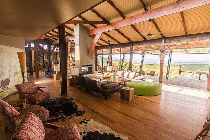 Spacious lounge with views out to the valley - photograph by Guy Upfold.